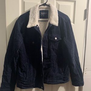 Navy blue corduroy jacket with white sheep fur